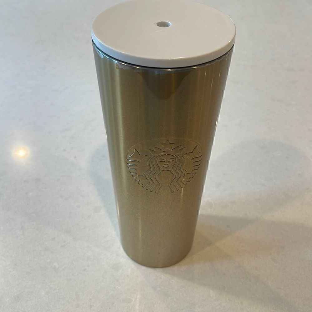 Starbucks cold cup with lid 24 oz, some flecking of color close to top.
